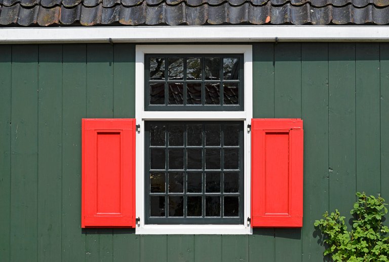 Window with red blinds