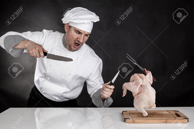 27889887-Angry-cook-fighting-with-knifes-Raw-chicken-attack-Stock-Photo.jpg