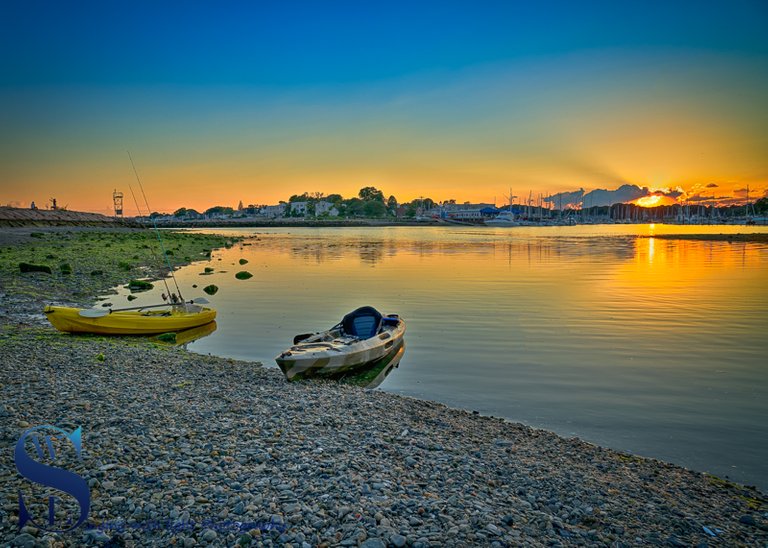 Couple of Kayaks by the shore.jpg