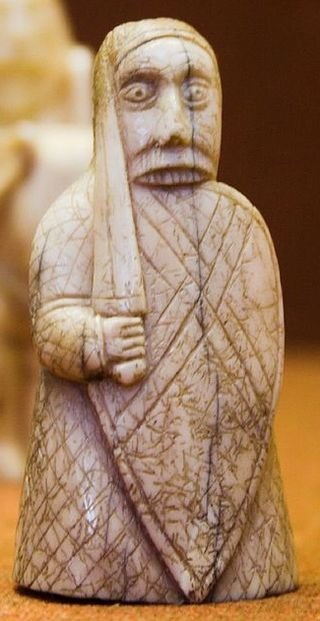 320px-Beserker,_Lewis_Chessmen,_British_Museum.jpg