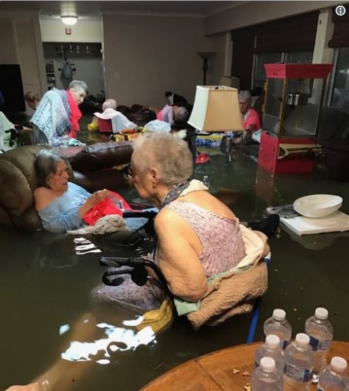 harvey pic - elderly in flood.JPG