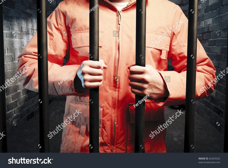 stock-photo-dark-prison-cell-at-night-62493325.jpg