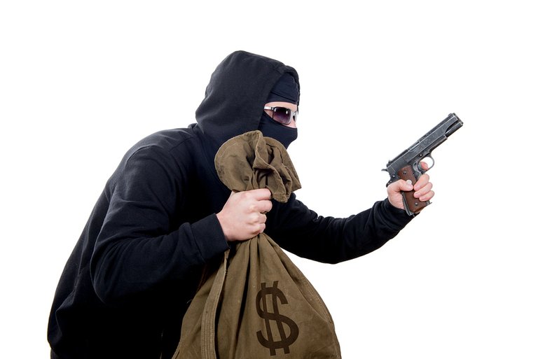 bigstock-Hooded-Robber-With-A-Gun-And-A-78546158.jpg