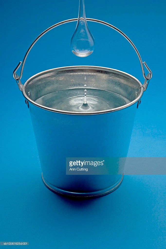 large-drop-falling-into-bucket-of-water-picture-idsb10067625d-001.jpeg