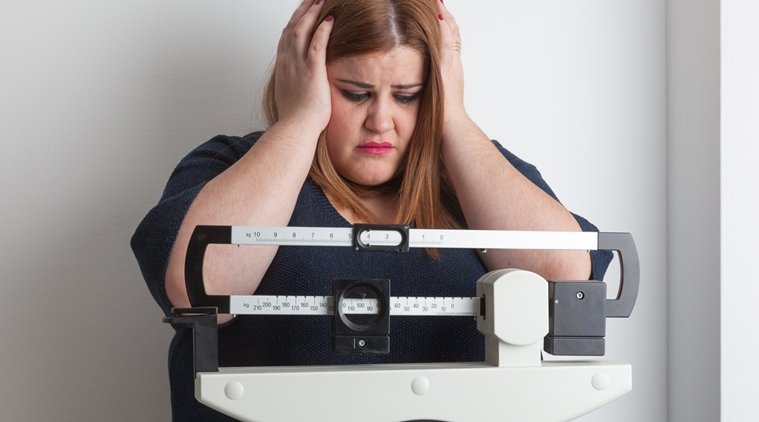 fat-woman-scales_759_thinkstockphotos-505603334.jpg