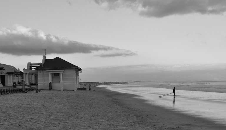 Cape Town Surfers Corner Surfer on Beach B&W.JPG