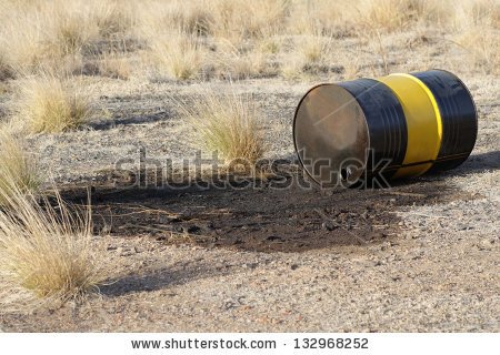 stock-photo-leaking-oil-barrel-wasting-nature-132968252.jpg