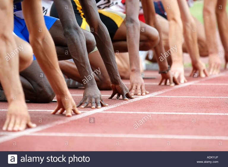 male-runners-lined-up-at-starting-line-ADKYJF.jpg