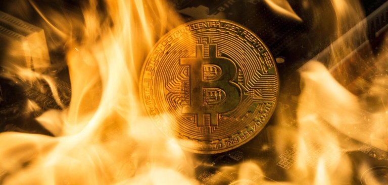 Symbol-photo-Bitcoin-crash-The-picture-shows-a-burning-Bitcoin-2.jpg