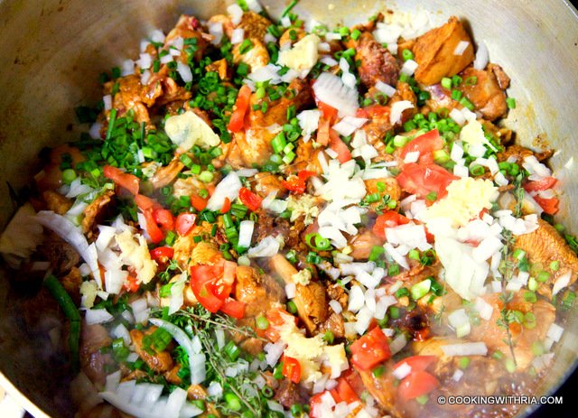 Trinidad Stewed Chicken-add herbs and tomato.jpg