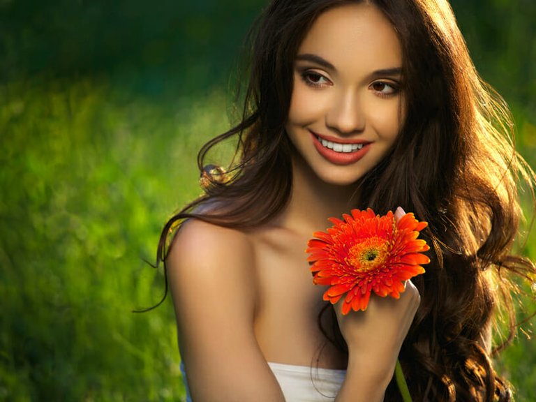 romantic gesture, Beautiful Girl With Red Flowers. Beautiful Model Woman Face.jpg