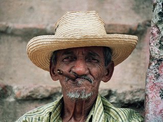 cigar-smoking-man-in-trinidad-1429091.jpg