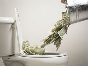 pouring-money-down-toilet.jpg