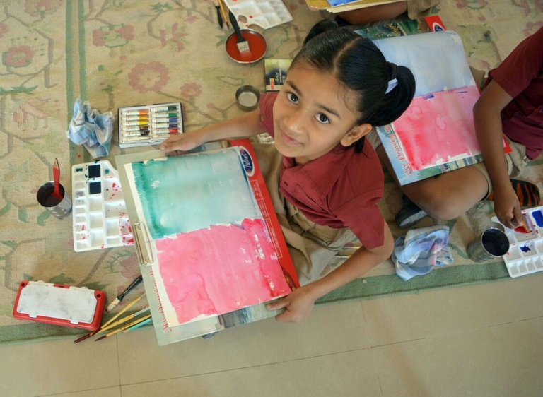 The youngest Participant of the workshop nailing down wash technique