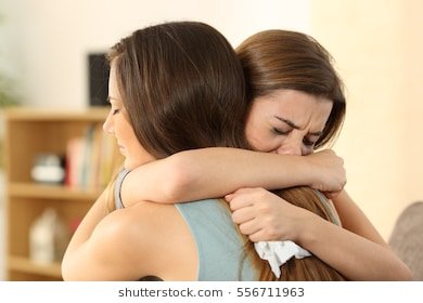 girl-embracing-comfort-her-sad-260nw-556711963.jpg