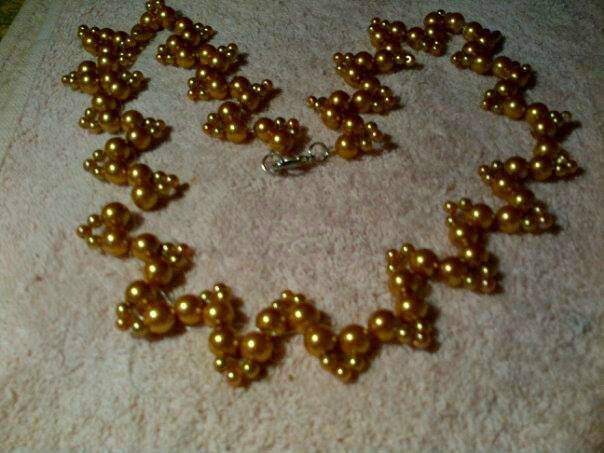 Gold beaded zig zag necklace.jpg