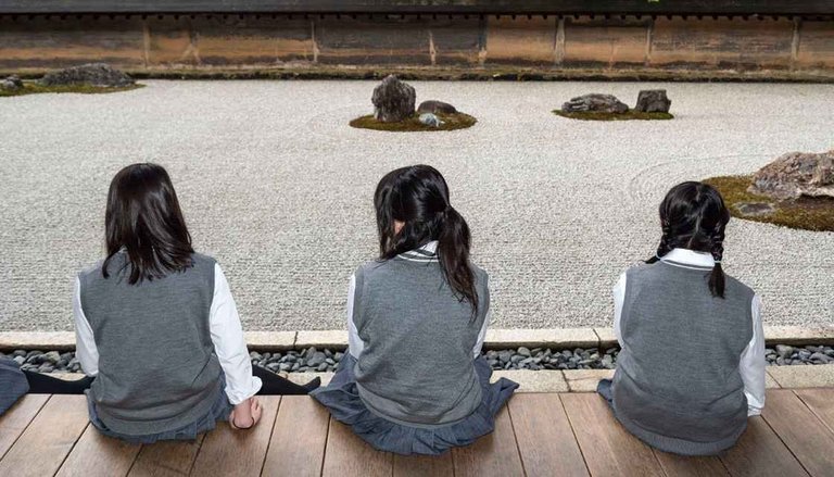 japanese-school-girls-rock-garden-getty-1120.jpg