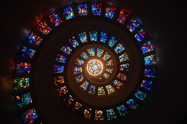 worms-eye-view-of-spiral-stained-glass-decors-through-the-roof.jpeg