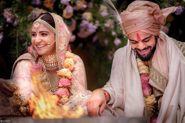 Anushka-Sharma-and-Virat-Kohli-look-royal-in-their-traditional-outfits-in-the-first-photos-from-their-wedding-in-Italy-01.jpg
