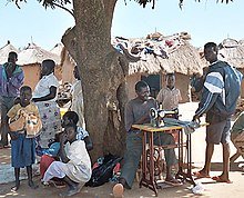 220px-Tailor_Lebuje_camp,_Uganda.jpg