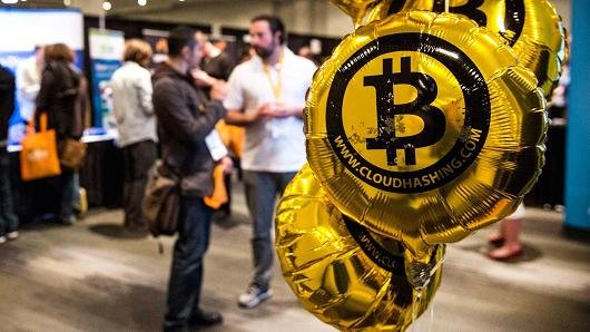 104492222-GettyImages-483236197-bitcoin.530x298.jpg