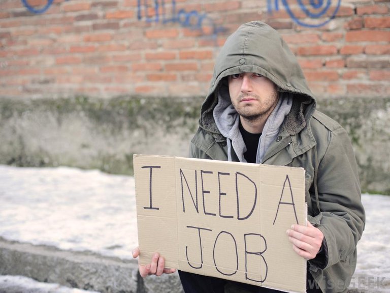 unemployed-man-with-sign.jpg