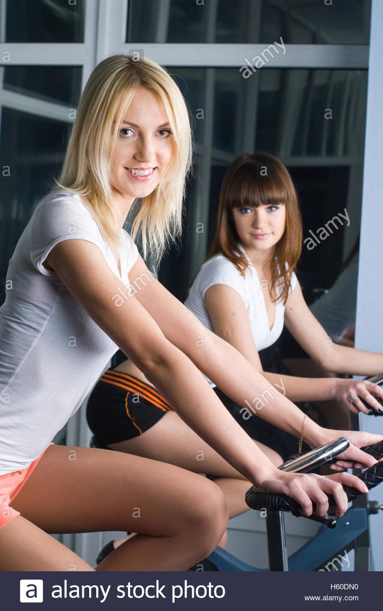 attractive-girls-on-bicycle-simulators-H60DN0.jpg