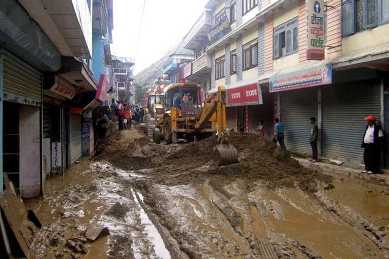 excavator-clears-the-muddy-road-in-Myagdi.jpg