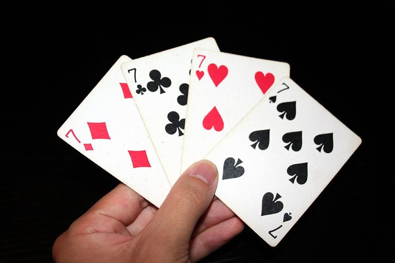 1200px-7_playing_cards.jpg