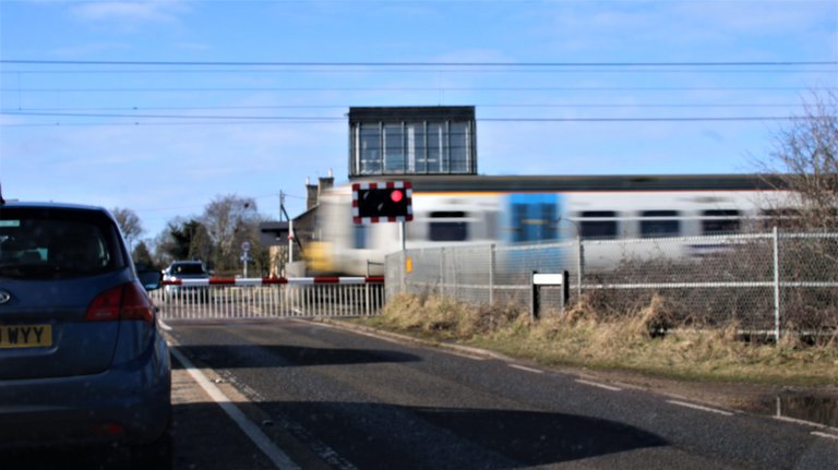 blue train crossing.jpg