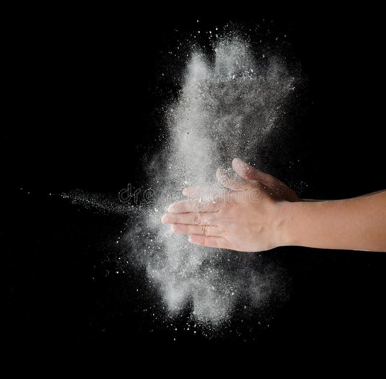 freeze-motion-dust-explosion-hands-isolated-black-background-33598694.jpg