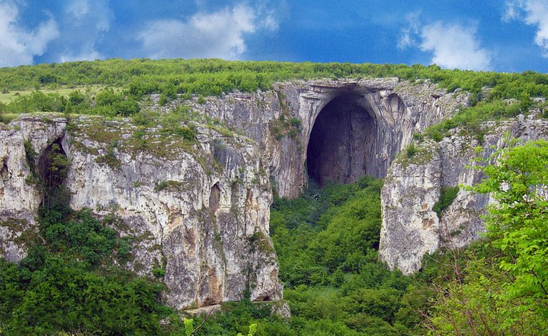 our_biggest_cave_entrance_69_meters_karlukovo_cars_by_teleportsofia-d4qhb73.jpg
