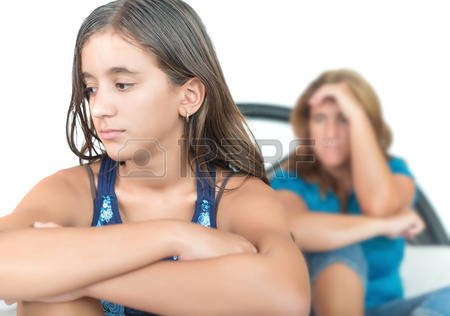 30463439-worried-and-thoughtful-teenage-girl-with-her-mother-at-home.jpg