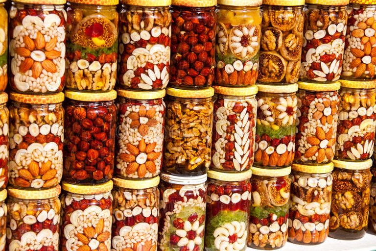 homemade-honey-dried-fruits-nuts-market-73807264.jpg