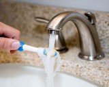 toothbrush_under_faucet-300x238.jpg