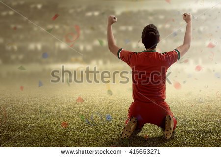 stock-photo-image-of-winning-football-player-after-score-in-a-match-415653271.jpg