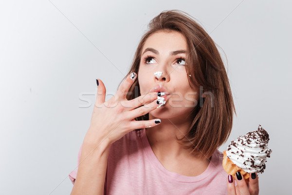 7880985_stock-photo-young-pretty-woman-eating-cake.jpg