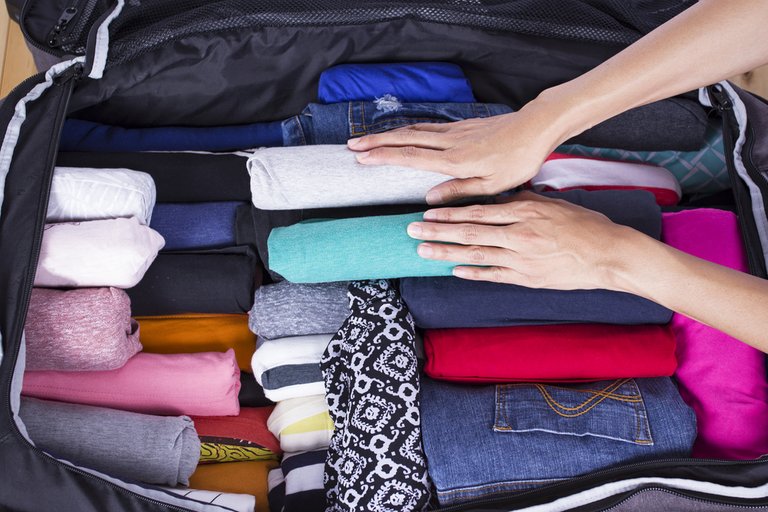 Lionesse-Travel-Hacks-to-Make-Life-Easier-Roll-Clothes.jpg