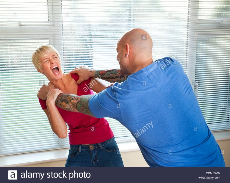 a-man-attacks-a-woman-CBMBWW.jpg