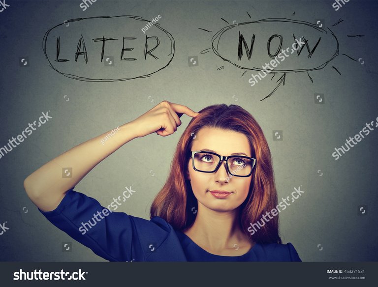 stock-photo-now-or-later-woman-thinking-looking-up-isolated-on-grey-wall-ba.jpg