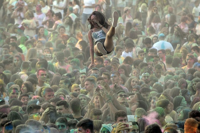 A reveler is tossed in the air.jpg