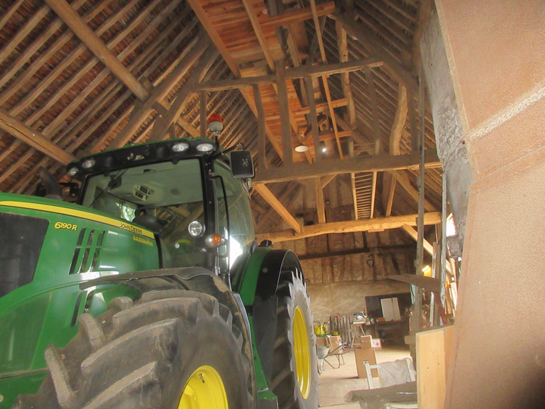 modern_tractor_old_barn.png