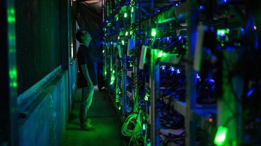 104495442-Chinese_bitcoin_mine.530x298.jpg