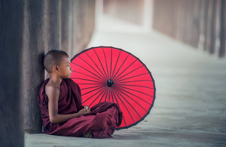 monk-boy-with-big-umbrella.jpg