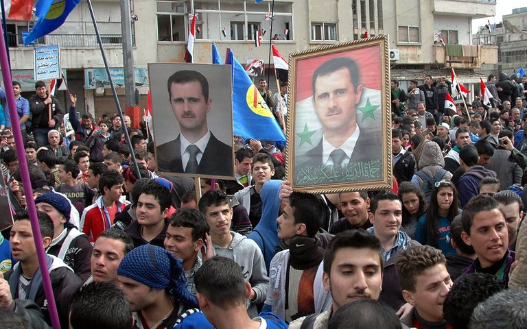 Syria-Assad-Rally-Mideast-Syria-Running_Muha1.jpg