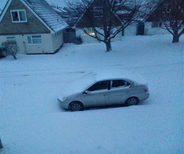 car covered in snow.jpg