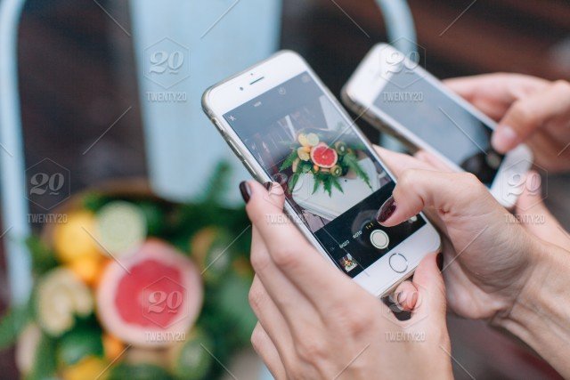 smmmmmmmmmmmmmmmmmtock-photo-holding-apple-hand-bouquet-lifestyle-woman-foreground-taking-photo-smarthphone-ad428b8b-208b-419c-a691-8344abc0c43f.jpg