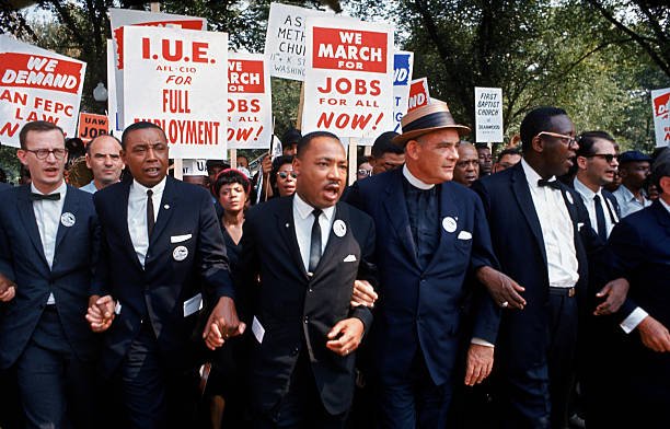 leaders-of-march-on-washington-for-jobs-freedom-marching-w-signs-picture-id50702738.jpg