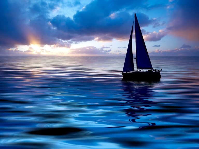 sail-boat-in-peaceful-waters.jpg