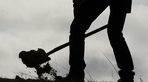 silhouette-man-digging-hole-shovel-footage-047600072_iconl.jpg